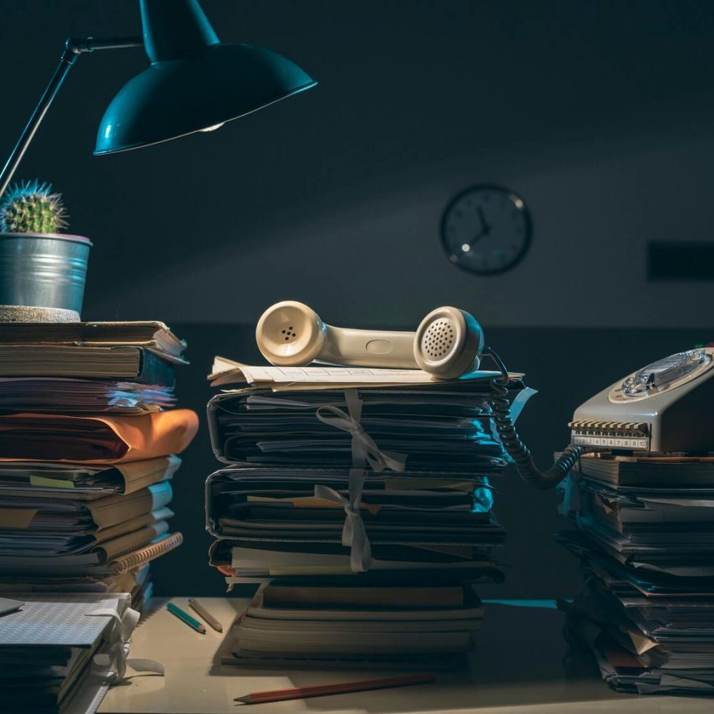 vintage-style-desk-with-lots-of-paperwork-1.jpg